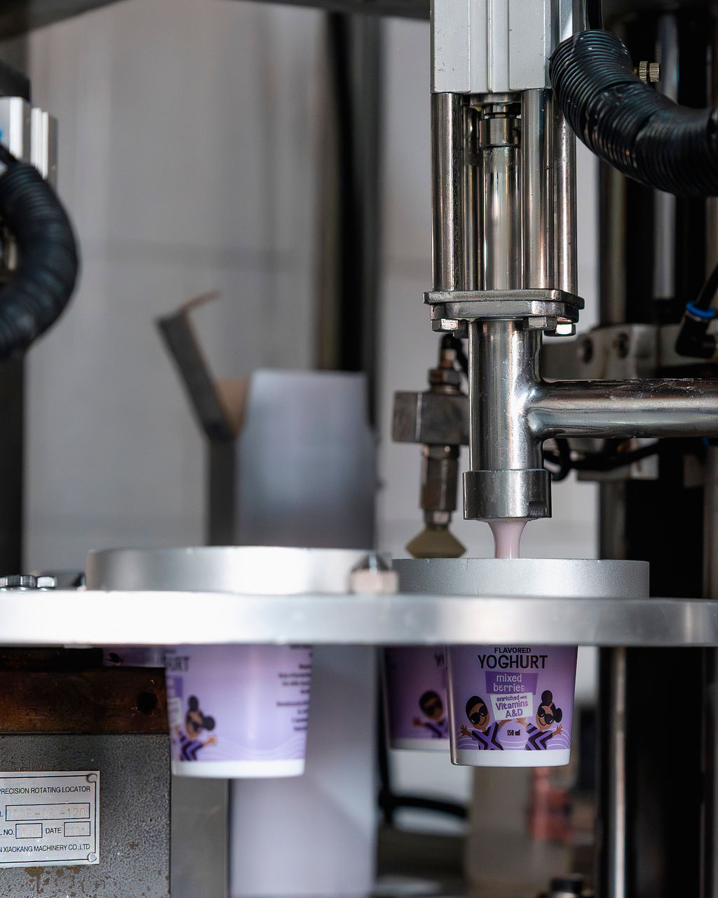 Yoghurt cups being filled on the Ishyo Foods production line